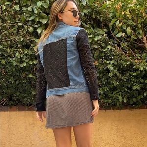 Denim jacket with lace sleeves